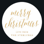 Gold Merry Christmas Personalised Holiday Sticker<br><div class="desc">Simple gold "merry christmas" script holiday stickers,  personalised with your family name. The script calligraphy is in a gold glitter effect (a printed effect,  not actual glitter).</div>