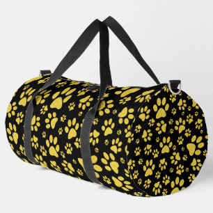 Gold metal pattern paws on black background duffle bag
