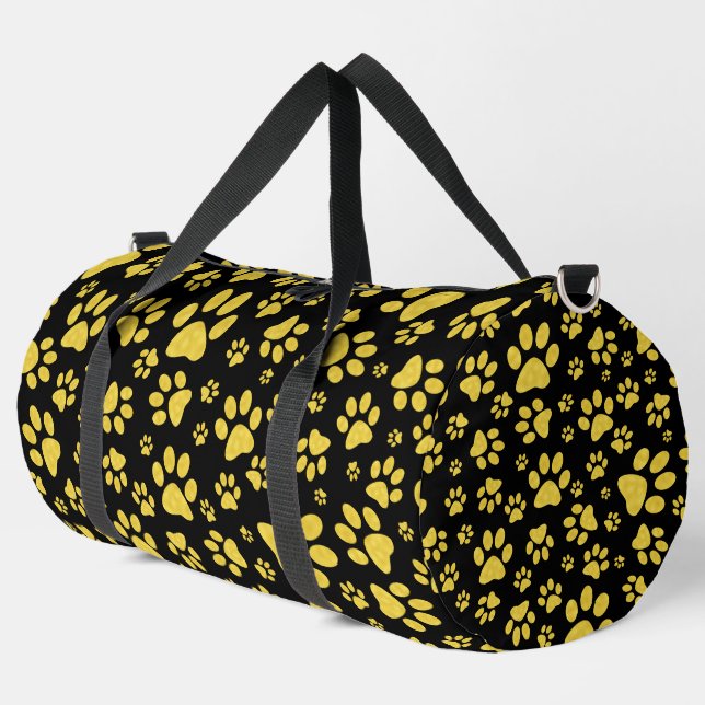 Gold metal pattern paws on black background duffle bag (Left Corner)