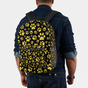 Gold metal pattern paws on black background printed backpack