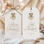Gold Mistletoe Merry Christmas | Feliz Navidad Gift Tags<br><div class="desc">This holiday gift tag features elegant,  romantic swirly calligraphy with a winter mistletoe bouquet and a festive 'Merry Christmas' on the front,  along with 'Feliz Navidad' script on the back. For more advanced customisation of this design,  please click the BLUE DESIGN TOOL BUTTON above!</div>