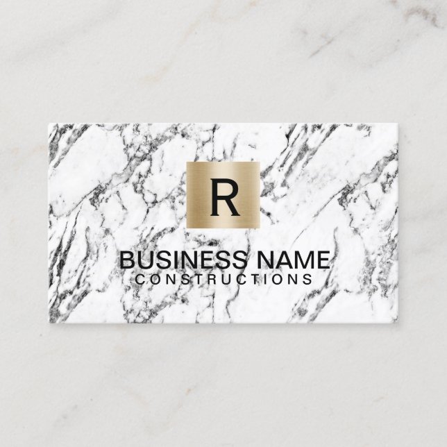 Gold Monogram Logo Modern Marble Construction Business Card (Front)