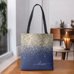 Gold Navy Blue Girly Glitter Sparkle Monogram Name Tote Bag<br><div class="desc">Navy Blue and Gold Faux Sparkle and Glitter Elegant Monogram Book Bag. This Book Bag can be customised to include your initial and first name and given as a gift for Christmas,  Sweet 16 Birthday,  Bridal Shower or a Wedding.</div>