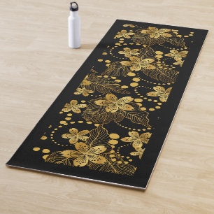 Gold on black tropical flowers and leaves pattern yoga mat