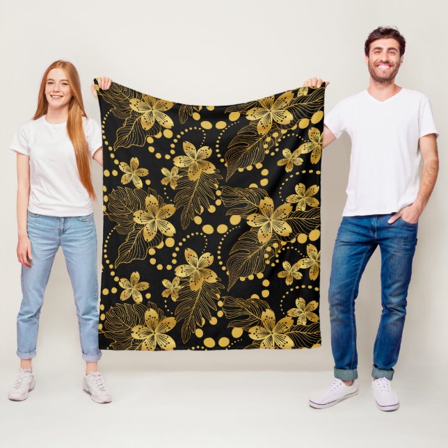 Gold on black tropical flowers & leaves fleece blanket (In Situ)
