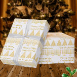 Gold On White Merry Happy Chrismukkah Holiday Wrapping Paper<br><div class="desc">Add your name to this fun Merry Happy Chrismukkah holiday wrapping paper in a festive gold and white pattern of Menorahs and Christmas trees. Simple and classic, this gift wrap is perfect for blended families who celebrate both Hanukkah and Christmas. With sleek minimalist artwork of squared off gold Menorahs and...</div>