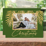 Gold Palms Topical Christmas Photo Holiday Card<br><div class="desc">Glamourous faux gold glitter palm fronds on a dark green background highlight your favourite photo on these holiday Christmas photo cards. Merry Christmas and your names on the bottom in chic lettering. High Definition for best quality. MORE COLORS and multi-photo style done for you in our collection.</div>