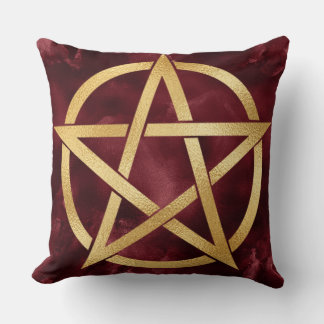 Gold Pentagram Symbol on Red Cushion