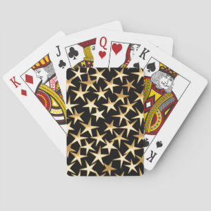 Gold stars on a black background playing cards