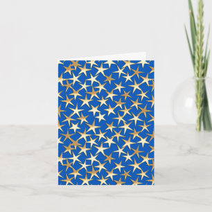 Gold stars on cobalt blue holiday card