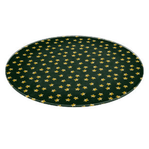 Gold stars on green cutting board