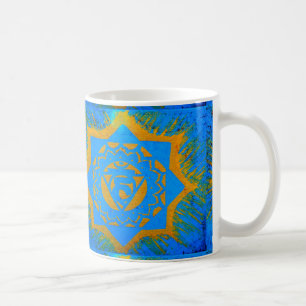 gold tantric symbol on blue coffee mug