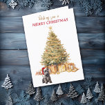 Gold Tree Scottish Terrier Dog Christmas Card<br><div class="desc">On the front of this Christmas card, an adorable Scottish Terrier Dog wears a red and white Santa hat and sits in front of a Holiday tree. The tree is decorated in gold, and matching gift packages are beneath it. The gold and red text says "Wishing you a MERRY CHRISTMAS"....</div>