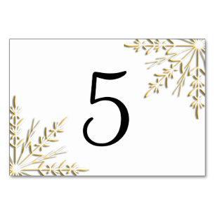 Gold Winter Snowflakes on White Table Numbers