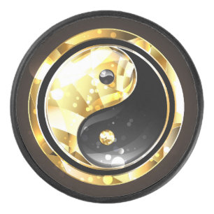 Gold Yin Yang on black Hockey Puck