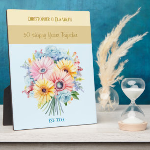 Golden 50th anniversary flowers names blue plaque