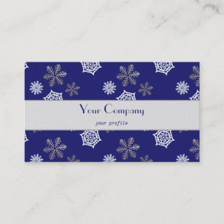 golden and white snowflakes against midnight blue business card