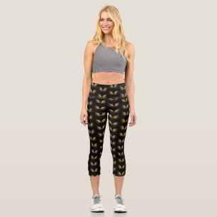 Golden Angel Wings on Black background Capri Leggings
