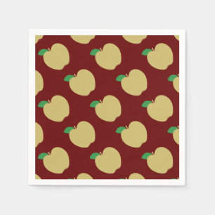 Golden Apple on Red Napkin