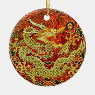 Golden asian dragon embroidered on dark red ceramic tree decoration