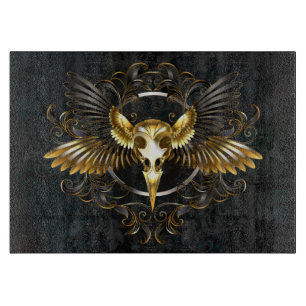 Golden Bird Skull on Black background Cutting Board