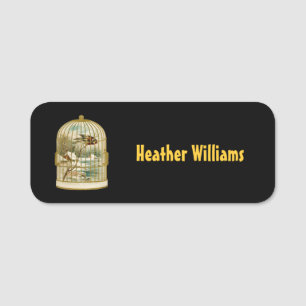 Golden Birdcage Winter Cabin Scene Bird on Black Name Tag
