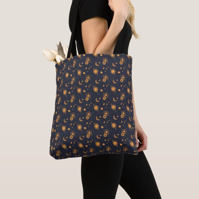 Golden black celestial sun moon galaxy pattern tote bag (Close Up)
