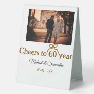 Golden bow cheers to 60 years anniversary wedding