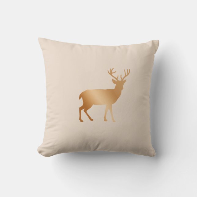 Golden brown reindeer silhouette on beige cushion (Front)