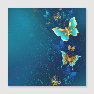 Golden Butterflies on a Blue Background