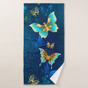 Golden Butterflies on a Blue Background Bath Towel