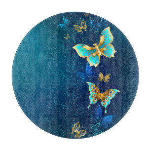 Golden Butterflies on a Blue Background Cutting Board