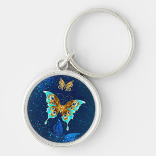Golden Butterflies on a Blue Background Key Ring
