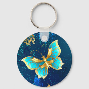 Golden Butterflies on a Blue Background Key Ring