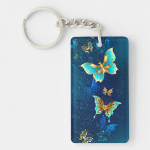 Golden Butterflies on a Blue Background Key Ring