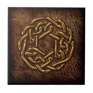 Golden celtic knot on leather tile