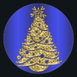 Golden Christmas Tree on Blue Classic Round Sticker<br><div class="desc">A colourful and decorative blue Christmas sticker featuring a glittering, golden Christmas tree on a metallic blue background, to add a sophisticated and elegant touch to your Christmas gifts or Christmas greetings this holiday season. (Designer notes: there is also matching wrapping paper, gift box, gift bag, envelope, ribbon and tissue...</div>