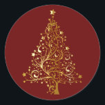 Golden Christmas Tree on Red Classic Round Sticker<br><div class="desc">Christmas tree in shades of golden yellow shading to simulate metallic gold. The Christmas tree is comprised of sweeping lines with star ornaments and topped with a gold star. Set on dark Christmas red.</div>