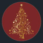 Golden Christmas Tree on Red Classic Round Sticker<br><div class="desc">Christmas tree in shades of golden yellow shading to simulate metallic gold. The Christmas tree is comprised of sweeping lines with star ornaments and topped with a gold star. Set on dark Christmas red.</div>