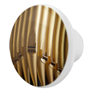 Golden-coloured organ pipes ceramic drawer pull