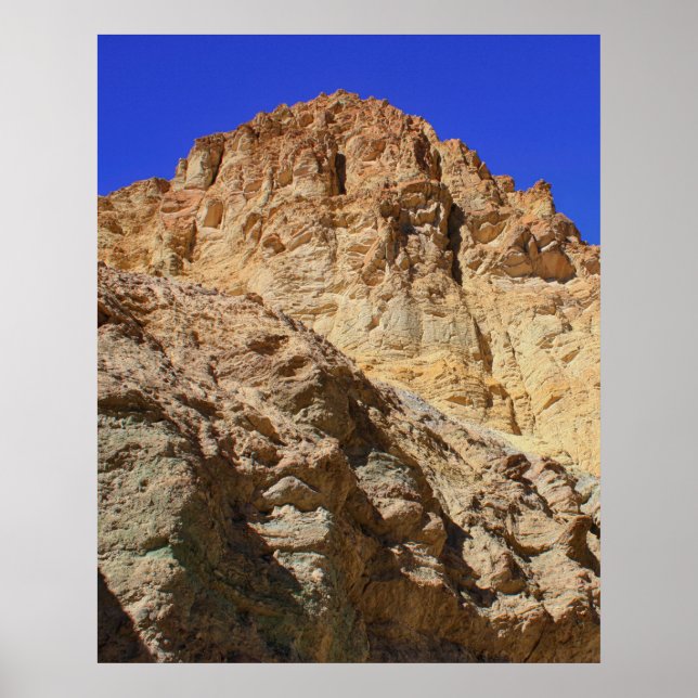 Golden Desert Cliff Under Blue Sky Poster (Front)