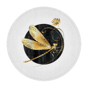 Golden dragonfly in black circle cutting board