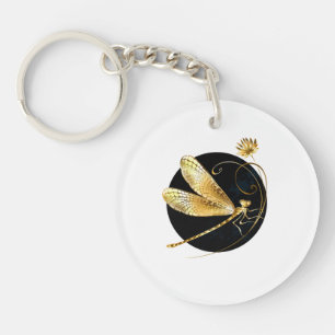 Golden dragonfly in black circle key ring