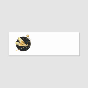Golden dragonfly in black circle name tag