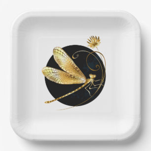 Golden dragonfly in black circle paper plate