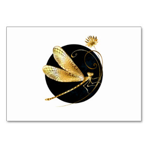 Golden dragonfly in black circle table number