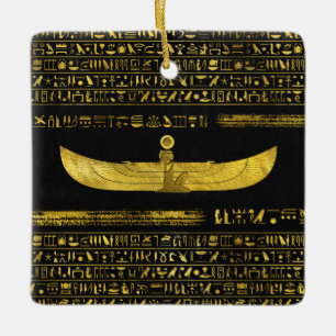 Golden Egyptian God Ornament on black leather