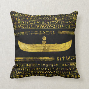 Golden Egyptian God Ornament on black leather Cushion