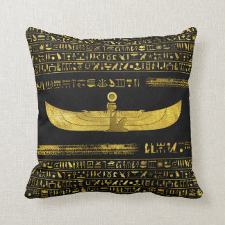 Golden Egyptian God Ornament on black leather Cushion