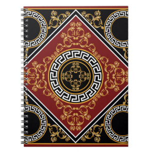 Golden floral baroque element with greek motif on notebook